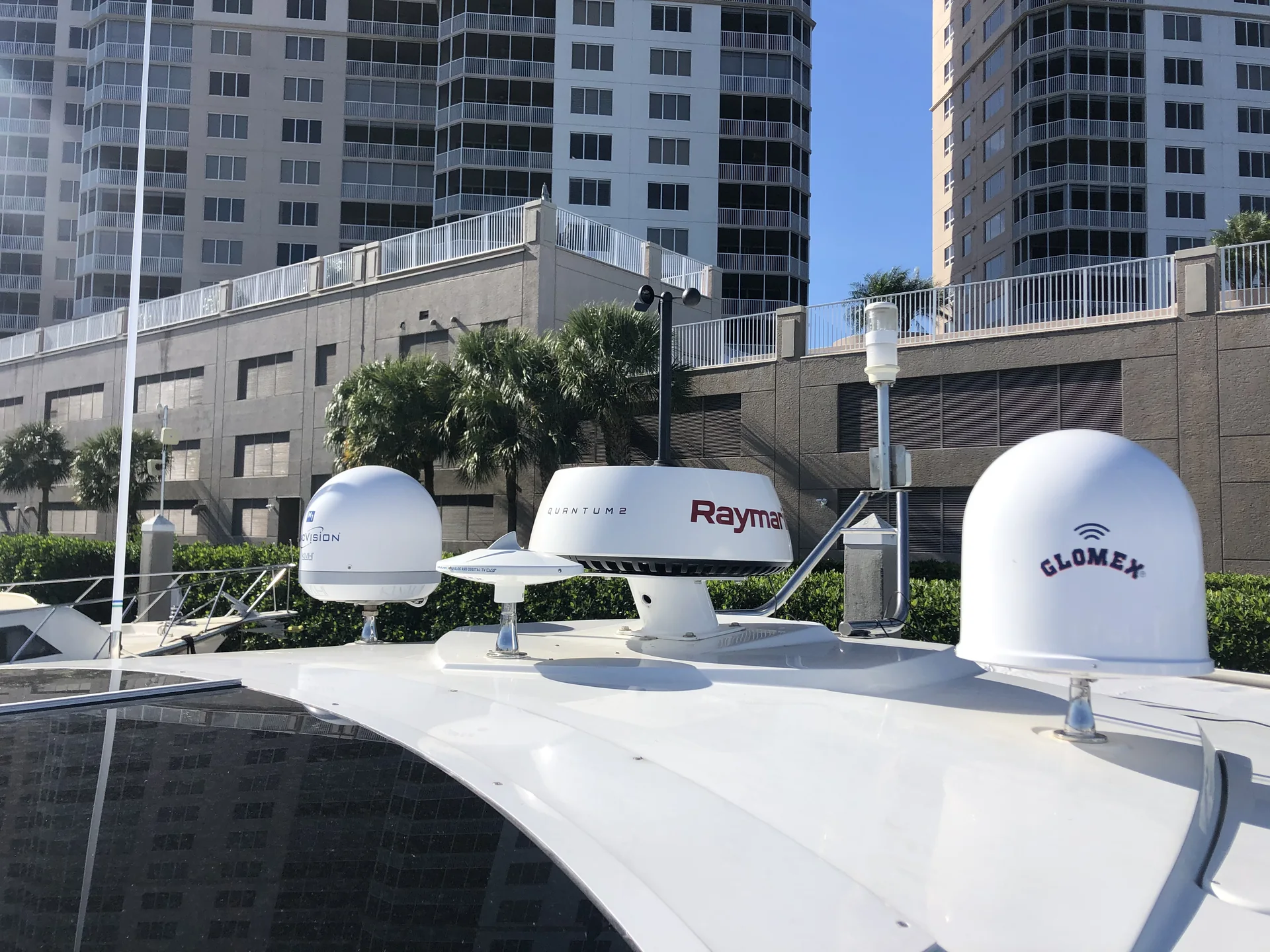 Marine radar and satellite communication equipment mounted above a vessel