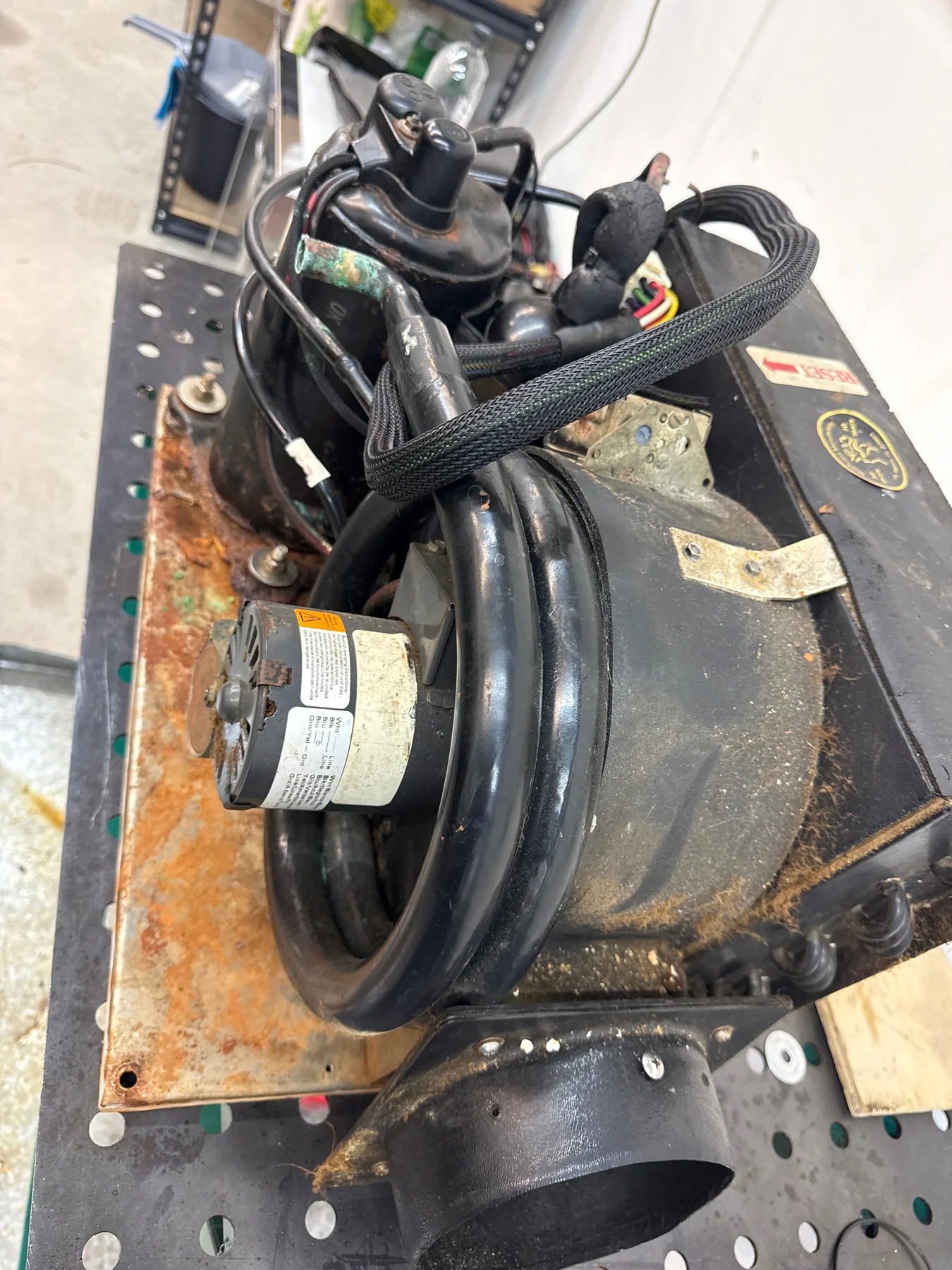 Removed self-contained marine air-conditioning unit with substantial corrosion