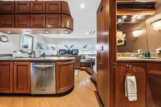 Stainless undercounter refrigeration integrated into a yacht galley